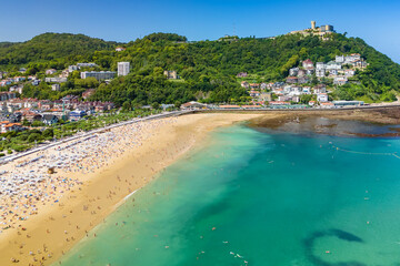 Aerial view of Ondarreta Beach with turquoise waters in San Sebastian or Donostia city, Basque Country, Spain