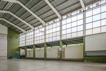 Indoor Sports Hall with Large Windows and Mezzanine, Empty Gymnasium Interior