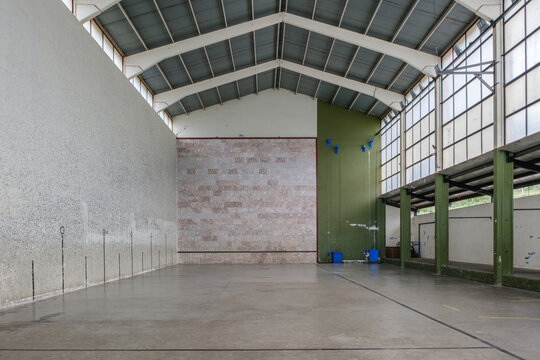 Empty Basque Pelota Court Interior, Fronton with High Vaulted Ceiling, Metal Structure