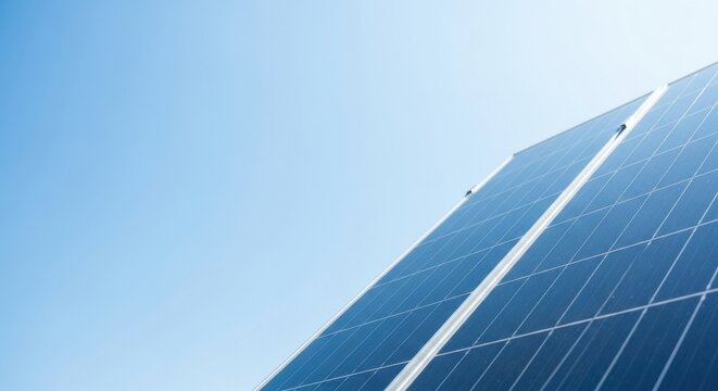 Solar panels stand against a bright blue sky offering a clean energy solution for a sustainable future