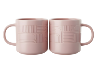 Pair of modern blush pink ceramic coffee mugs featuring an abstract geometric pattern isolated on a studio background.