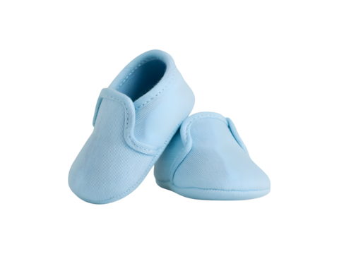 Pair of soft light blue canvas baby shoes for newborns and infants, isolated object cutout on a transparent background.