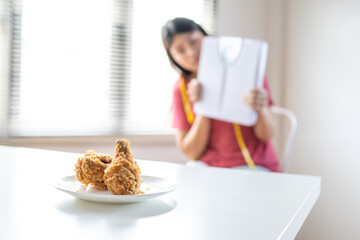 Woman on dieting for good health concept, No Cheat Meal, Stop Eating Junk Food Concept