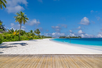 Obraz premium Untouched tropical coastline white sand beach extended wooden boardwalk tranquil blue ocean bright sunshine sky. Beautiful resort getaway destination perfect summer holiday escape backdrop tourism