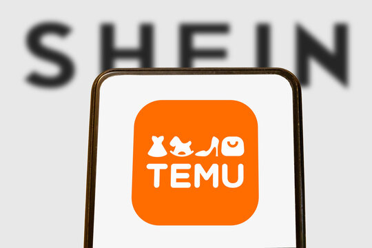 Warsaw, Poland - November 8, 2025: The Temu logo is prominently displayed against a blurred background featuring the Shein logo, representing e-commerce.