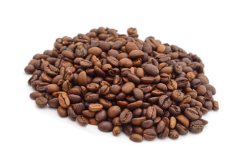 Pile of roasted coffee beans isolated on white background.