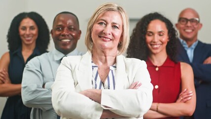 Confident Diverse Business Team Smiling Together in a Professional Corporate Office Setting
