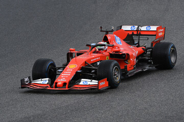 Naklejka premium Scarperia; Italy - October 24th 2025: Ferrari SF90 ex Sebastian Vettel and Charles Leclerc in action during Ferrari World Finals 2025 at Mugello Circuit in Italy.