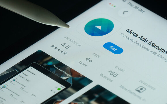 Dhaka, Bangladesh- 30 Oct 2025: meta ads manager app on a iPad screen with a pen pointing at the install option.