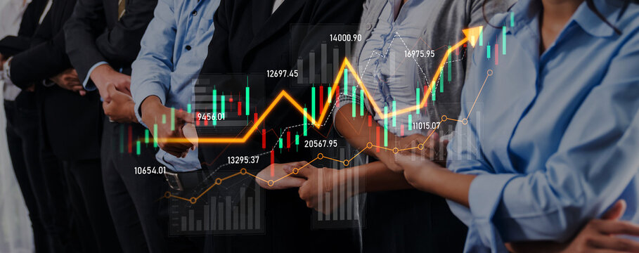 Business professionals collaborate to analyze financial data while chart graphics illustrate market growth, trends, and economic insights in a modern office setting. Scalp - Powered by Adobe