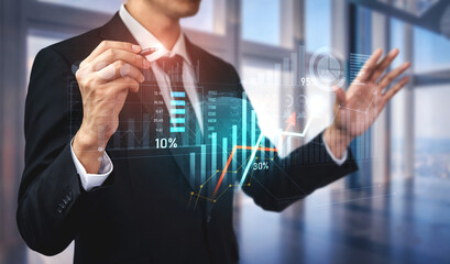 A businessman in a suit interacts with a futuristic data visualization in a modern office, showcasing graphs and analytics that signify growth and success in business. Scalp