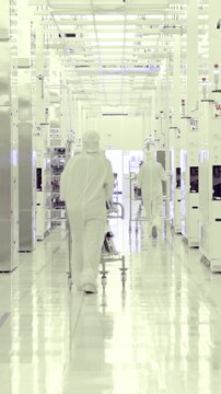Vertical footage of workers in a Semiconductor manufacturing facility