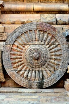 Ancient stone chariot wheel carving at the Airavatesvara Temple (UNESCO heritage site) in Darasuram, Tamil Nadu, showcasing the Chola dynasty&rsquo;s remarkable craftsmanship and architectural detailing
