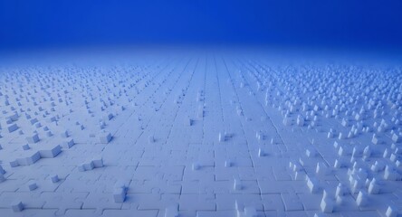 Aerial view of a vast, snow-covered landscape under a clear blue sky, winter scene.
