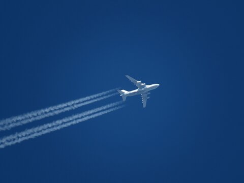 Feb 27, 2021. Lincolnshire, UK: Antonov An-124 flying at high altitude in a clear blue sky with contrails