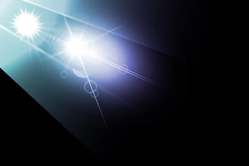 Blue and purple light flare with bright lens reflection glow isolated on black background