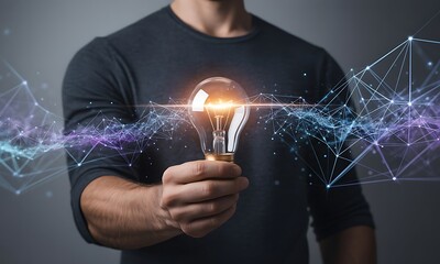 Man Holding Illuminated Light Bulb with Digital Network Connections, Idea Concept.