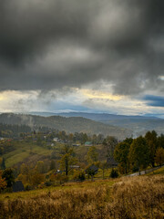 Misty Autumn Rain Clouds over Ukrainian Carpathian Mountains.