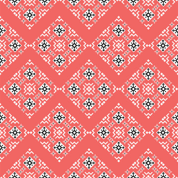 Seamless pattern of Coral Pink Ethnic Geometric Pattern - Traditional Nordic Folk Art Seamless Ornament.