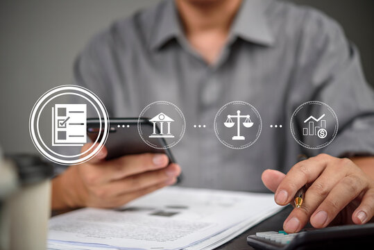 Businessman hand using smartphone calculator for tax payment, mobile banking. Virtual interface icon checklist, bank, legal, investment. Financial technology (Fintech) concept, document analysis. - Powered by Adobe