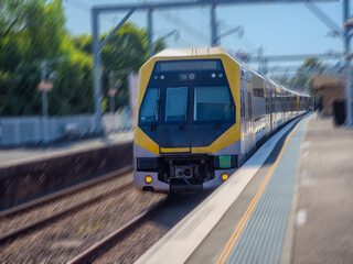 Obraz premium Passenger Train going through Summer Hill train station a suburban Sydney train Station NSW Australia