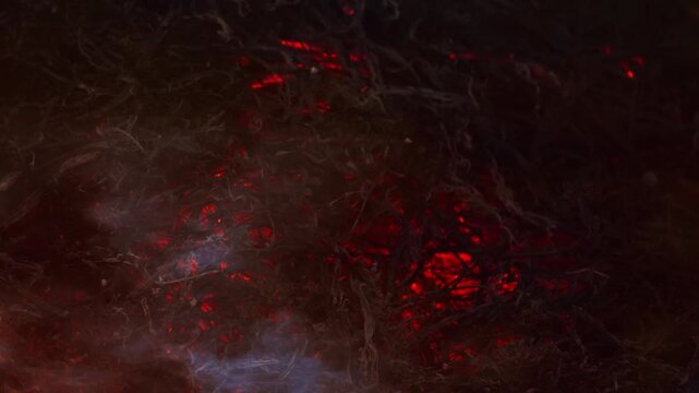 Dark abstract red and black background with grunge texture and smoke suggests fire and explosion design