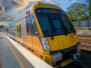 Obraz premium Passenger Train going through Summer Hill train station a suburban Sydney train Station NSW Australia