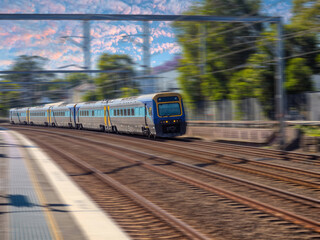 Passenger Train going through Summer Hill train station a suburban Sydney train Station NSW Australia