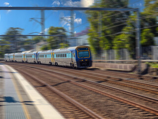 Passenger Train going through Summer Hill train station a suburban Sydney train Station NSW Australia