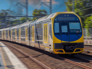 Obraz premium Passenger Train going through Summer Hill train station a suburban Sydney train Station NSW Australia