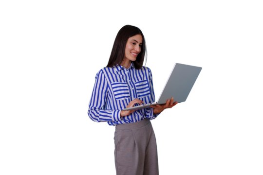 Woman standing, holding a laptop, typing on the keyboard and smiling. Transparent background for versatile use