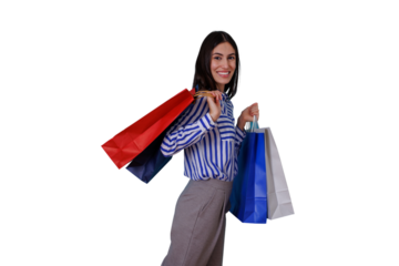 Happy woman carrying shopping bags, enjoying consumerism and retail therapy, walking and smiling with purchases on transparent background