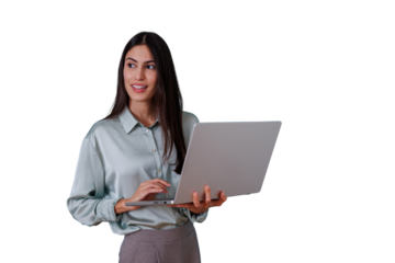 Businesswoman holding a laptop while typing and smiling, exuding confidence and professionalism, on transparent background