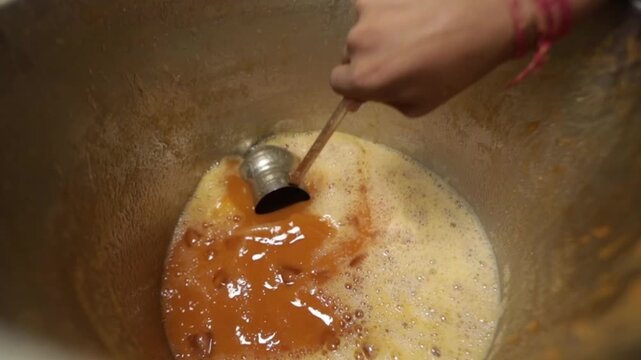 Preparing fresh wood apple juice. Healthy summer drink.