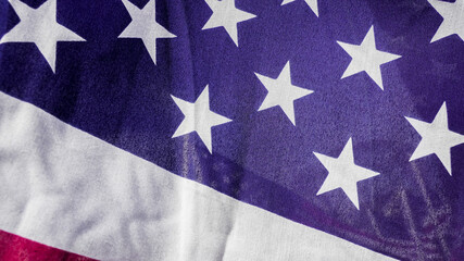 Fototapeta premium American flag with stars and stripes displayed close-up fabric texture