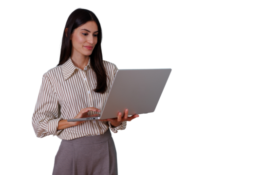 Businesswoman standing, holding and working on laptop, typing with one hand, transparent background