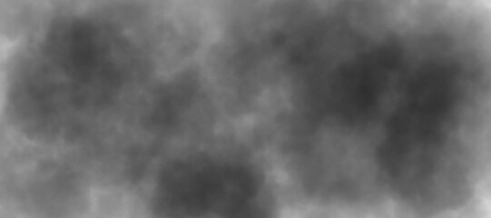 A dense cloud of smoke fills the scene, creating a textured gradient of gray and black shades