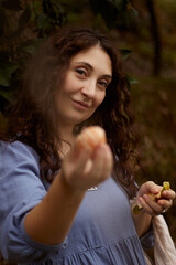 a girl shares a tangerine