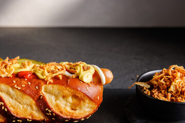 Street Food Delight Hotdog with Mustard, Mayo, and Ketchupon on Dark Background