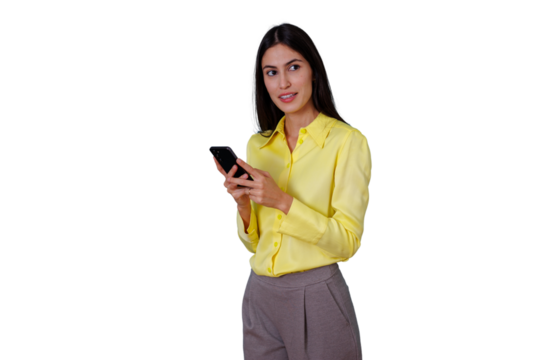 Professional woman in yellow shirt using smartphone, engaging with mobile technology and digital communication, transparent background