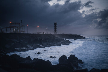 Moody Night Seascape with Lighthouse and Stormy Sky, Tenerife, Canary Islands