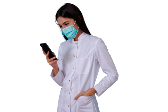 Female doctor in lab coat and surgical mask using smartphone, digital medical communication on transparent background