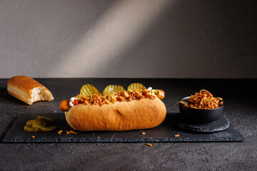 Street Food Delight Hotdog with Mustard, Mayo, and Ketchupon on Dark Background