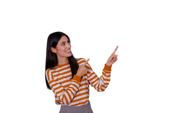 Smiling young woman pointing up and right with both hands, showing or indicating direction, transparent background