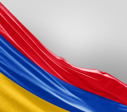 Armenia flag waving on grey background. Armenia national flag for independence day. - Powered by Adobe