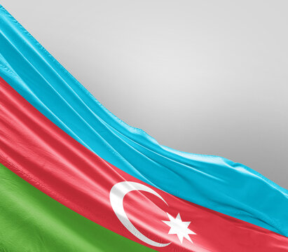 Azerbaijan flag waving on grey background. Azerbaijan national flag for independence day.