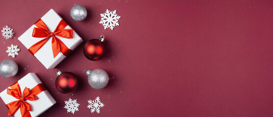 Holiday Cheer: Gift boxes and decorations arranged on a festive backdrop. Capturing the spirit of giving and celebration.