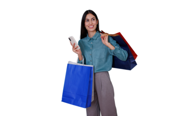 Happy young woman smiling, holding smartphone and various shopping bags, enjoying consumerism, transparent background