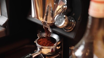 ground coffee is poured into a coffee machine to make fresh coffee in a coffee shop or restaurant in slow motion vertical video - Powered by Adobe