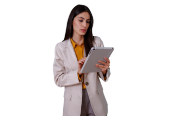 Businesswoman looking at tablet, interacting with screen. Professional female managing corporate data using a touchscreen device